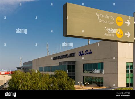 Larnaca, Cyprus. May 2018. A view of departures and arrival signage at ...