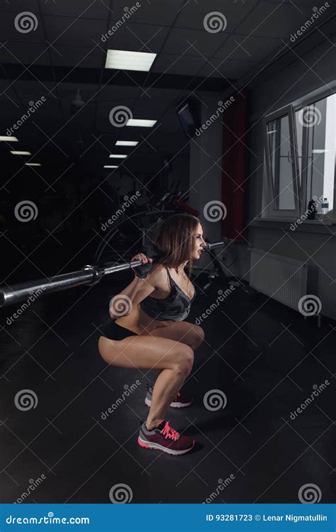 Beautiful Sporty Woman Doing Squat Workout in Gym. Stock Image - Image ...