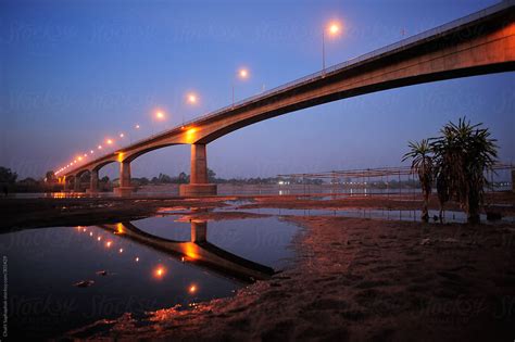 "Thai–Lao Friendship Bridge" by Stocksy Contributor "Chalit Saphaphak ...