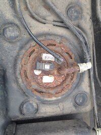 rusty fuel pump lock ring removal | GMTNation