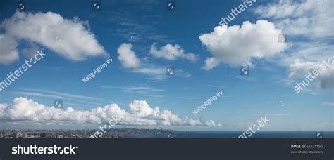 Blue Sky White Fluffy Clouds Noon Stock Photo 68221150 - Shutterstock