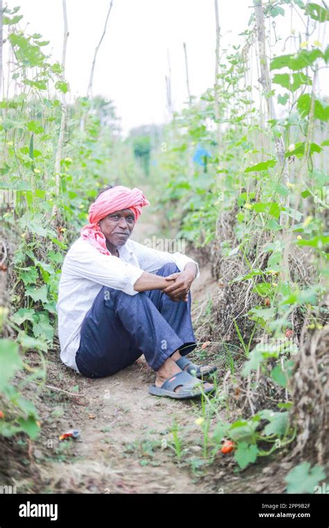 Indian poor farmer in farm, sad farmer, loss of farmer Stock Photo - Alamy