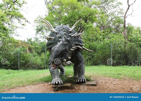 The Most Beautiful Dinosaur Sculptures Placed in Jungle Park Photograph ...