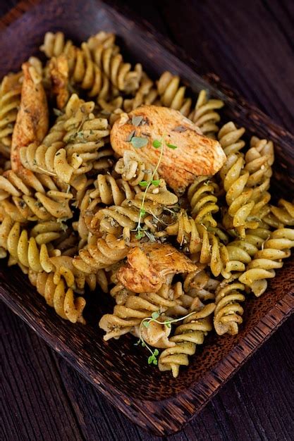 Premium Photo | Fusilli pasta pesto