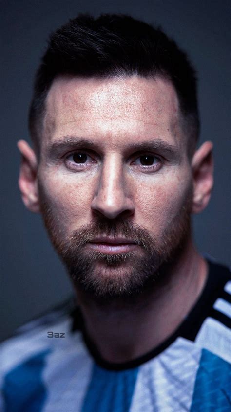 a close up of a person with a beard and wearing a soccer jersey looking ...