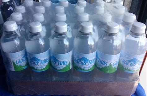 Bottled Spring Water home and office delivery. Custom logo water.