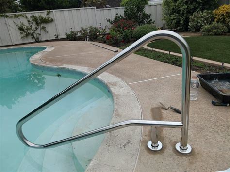 New safety handrail in existing concrete pool deck. Concrete Pool, Pool ...