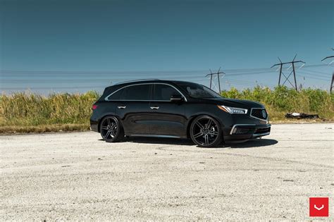 Black on Black Mean Acura MDX Enhanced with Crystal Clear Headlights