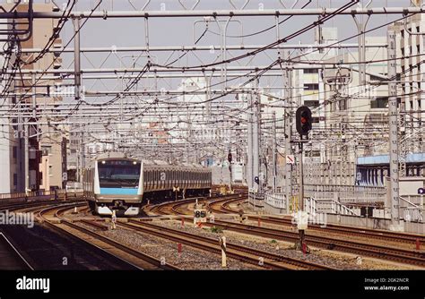 Tokyo, Japan - Apr 7, 2019. A train running on track at railway station ...