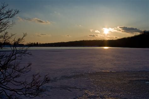 Sunset over frozen pond | Andrew Malone | Flickr