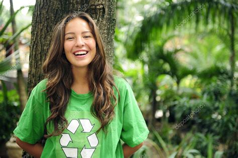 Environmental activist in the forest wearing re Stock Photo by ...