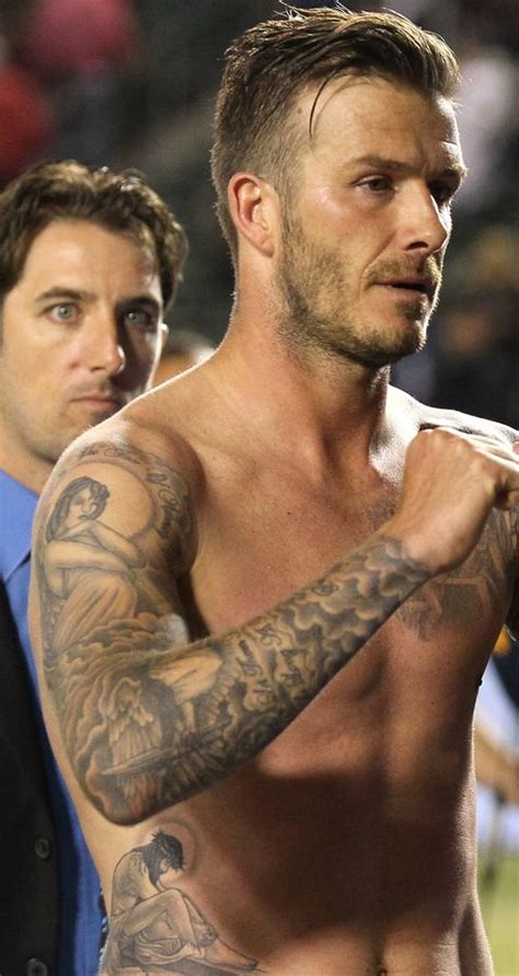 David Beckham's 60 Plus Tattoos and Their Meanings