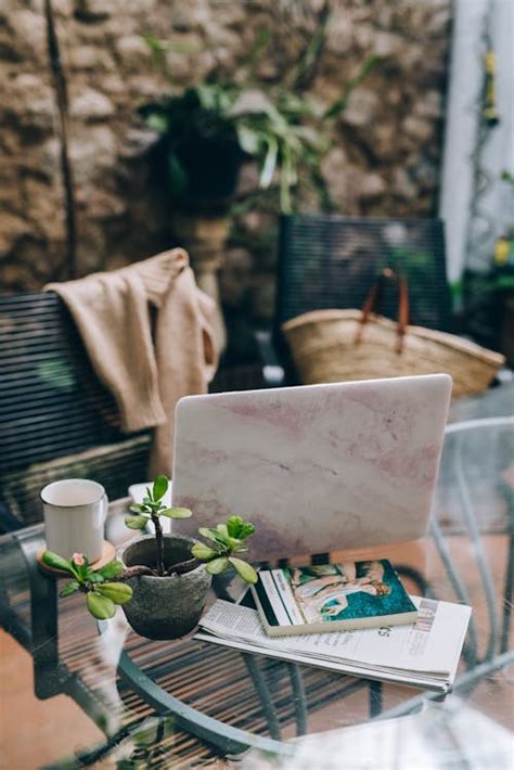 Laptop on Wooden Table · Free Stock Photo