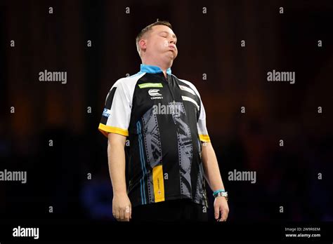 Chris Dobey celebrates after beating Michael Smith (not pictured) on ...