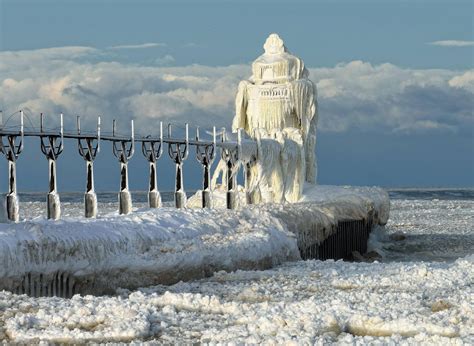 Frozen St. Joseph North Pier on Lake Michigan, USA - Places To See In ...