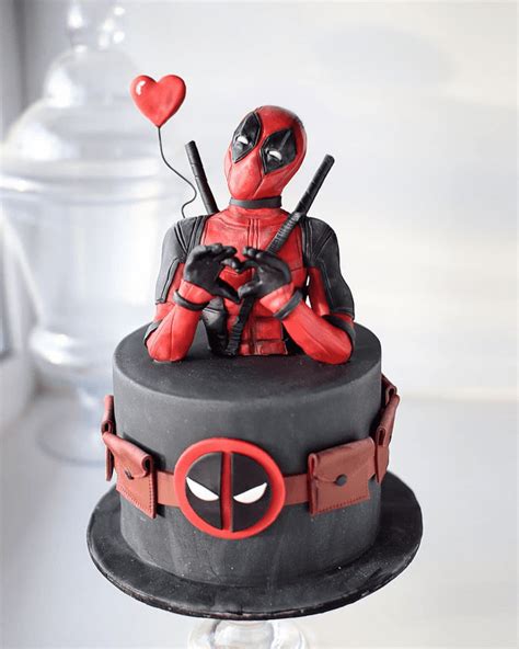 there is a cake with a deadpool on it