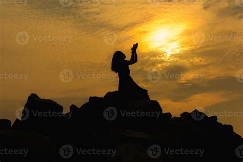 Silhouette sad girl at sunset. 13321346 Stock Photo at Vecteezy