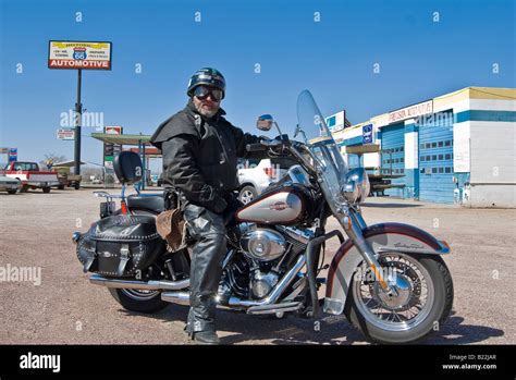 Biker with his Harley Davidson Stock Photo - Alamy