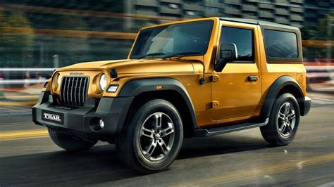 Maruti Suzuki Jimny 5-door vs Mahindra Thar: Price, specs comparison ...