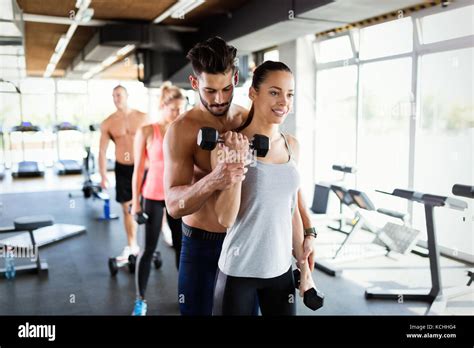 Group of people have workout in gym Stock Photo - Alamy