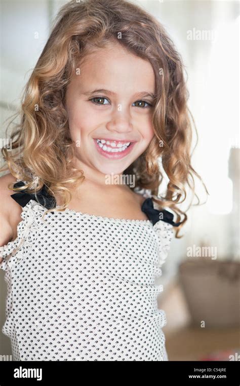 Portrait of a cute little girl smiling Stock Photo - Alamy