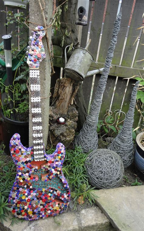 an old Guitar I revamped for my garden. | Famous guitars, Guitar ...