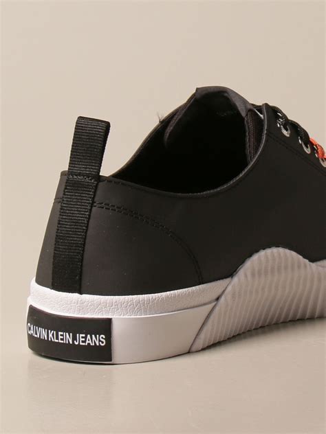 CALVIN KLEIN JEANS: Sneakers in canvas spalmato - Nero | Sneakers ...