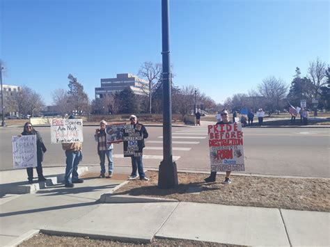 Group protests outside Greeley-Evans School District 6 board members ...