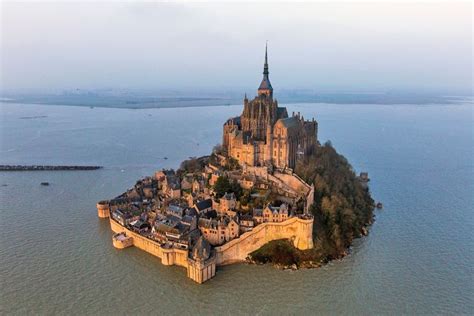 Stone castle on the oasis of Mont Saint-Michel, France | World heritage ...