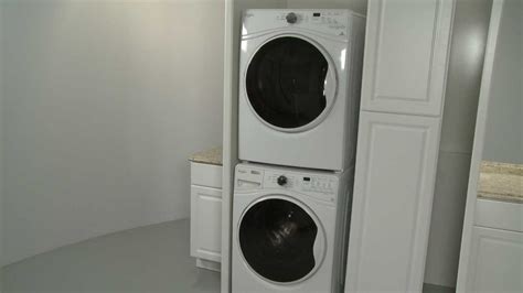 How to install a stackable washer and dryer in a tight space ...