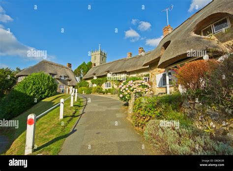 The pretty thatched Godshill cottages on the Isle of Wight Stock Photo ...