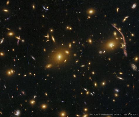 APOD: 2016 August 28 - Abell 370: Galaxy Cluster Gravitational Lens