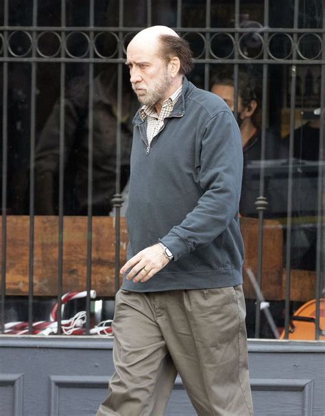 Nicolas Cage looks unrecognizable with bald head and grey beard in ...