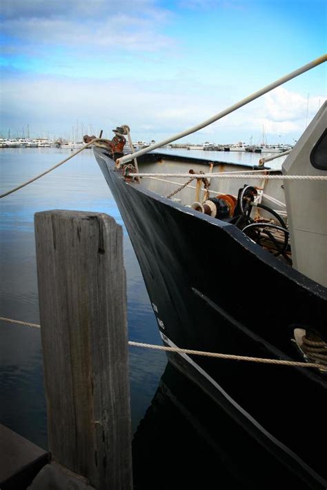 Fishing trawler in a harbor 2215598 Stock Photo at Vecteezy