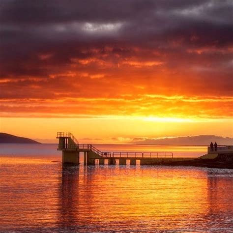 Sunset over Galway Bay at the Blackrock Diving Tower (Credit: Liam ...