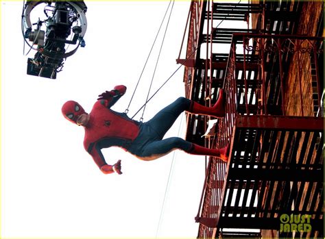 Full Sized Photo of tom holland performs his own spider man stunts on ...