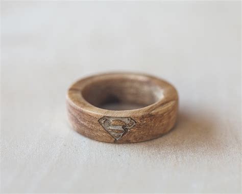 Laser Engraved Custom Wood Rings With Super Hero Logos