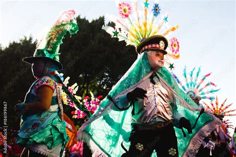 mexican dancers showcasing their traditional folk costumes rich in ...