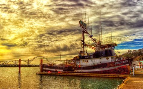 Download Large Fishing Boat In The Harbor Wallpaper | Wallpapers.com