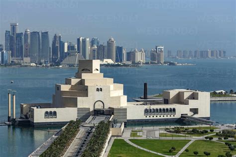 Doha Museum of Islamic Art in harbor, Doha, Qatar stock photo