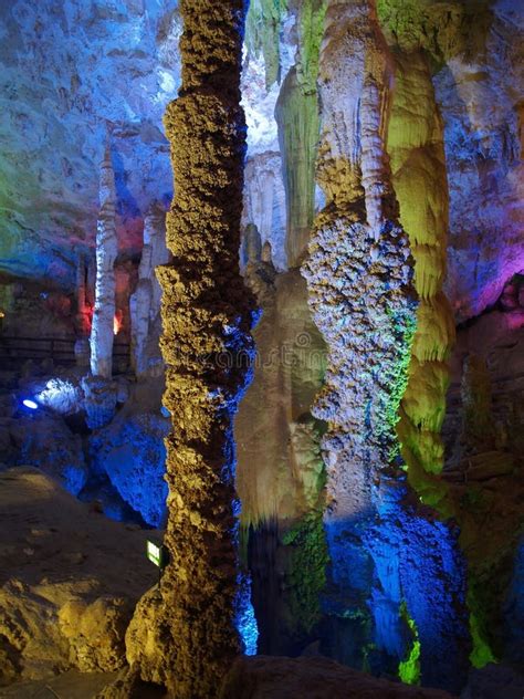 Cave Interior with Colorful Light Stock Photo - Image of light, roots ...