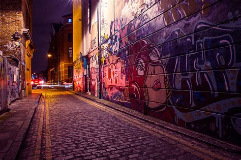 Royalty-Free photo: City side street with street art and graffiti ...