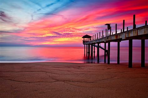 Serene Sunset Over the Ocean Pier