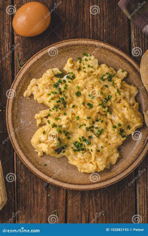 Scrambled eggs with herbs stock image. Image of omelet - 102882193