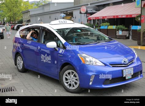 toyota prius taxi Stock Photo - Alamy