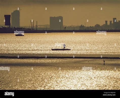 Silhouette Man Fishing During Sunset Stock Photo - Alamy