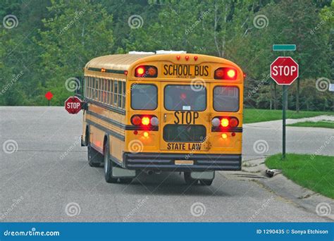 School Bus at Stop Sign stock image. Image of education - 1290435