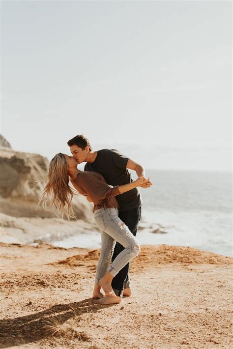 fun playful couples beach photography, running barefoot in the sand ...