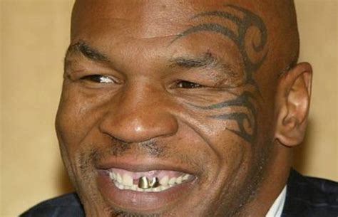 Mike Tyson Knocked Out the Gap Between His Teeth!? | Complex