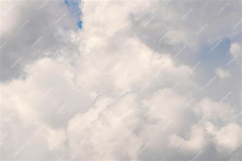 Premium Photo | White fluffy clouds background